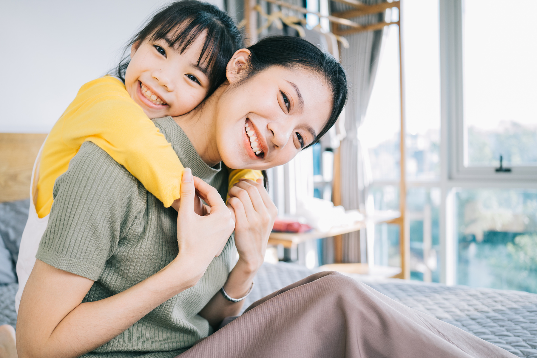 Asian Mother and Daughter at Home Together