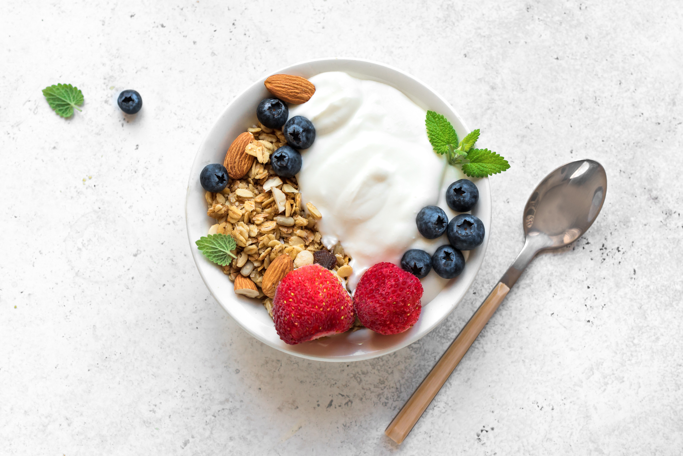 Healthy breakfast with yogurt, granola, berries